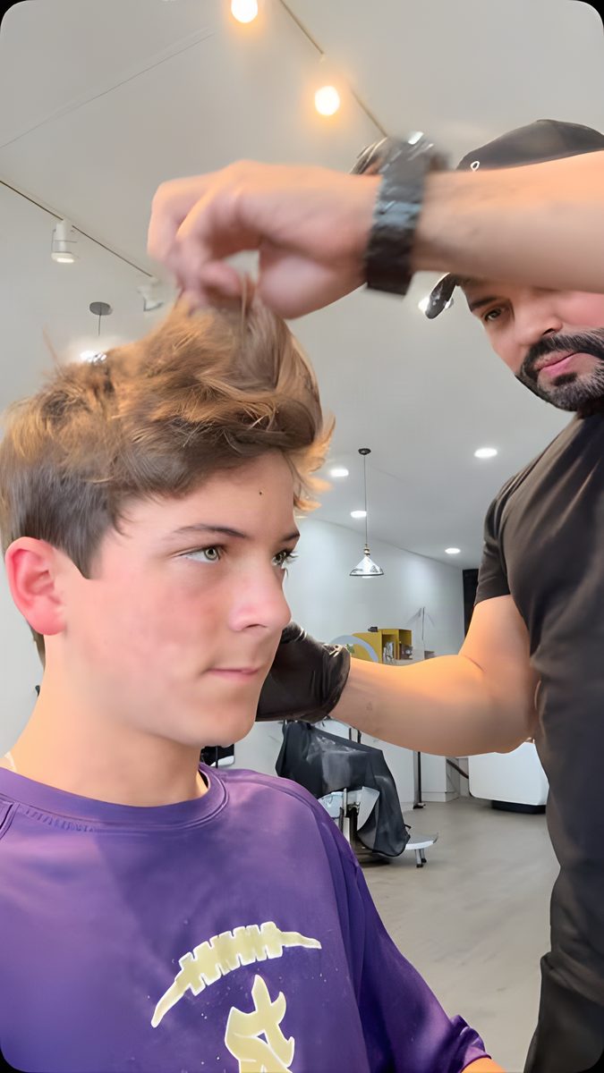 Cutting a young client's hair